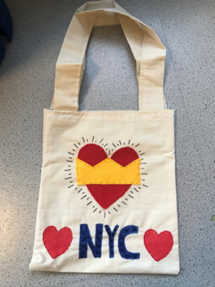 Image of a bag made by a year 9 student using a variety of techniques such as applique, embroidery and stencilling – inspired by New York and new York artist