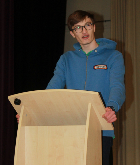 A student sharing his experience at the Duke of Edinburgh Awards Evening 