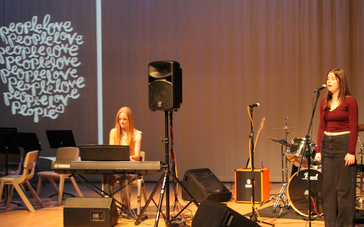 Two students performing at the Music Concert 