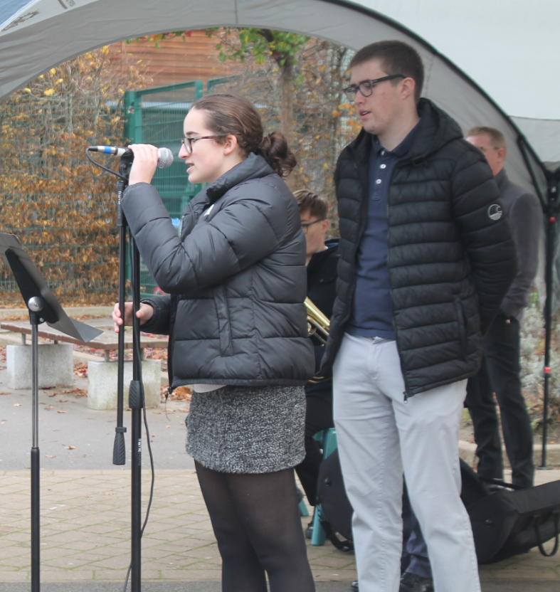 Senior Student Leaders reading a poem at the Remembrance service at schoo