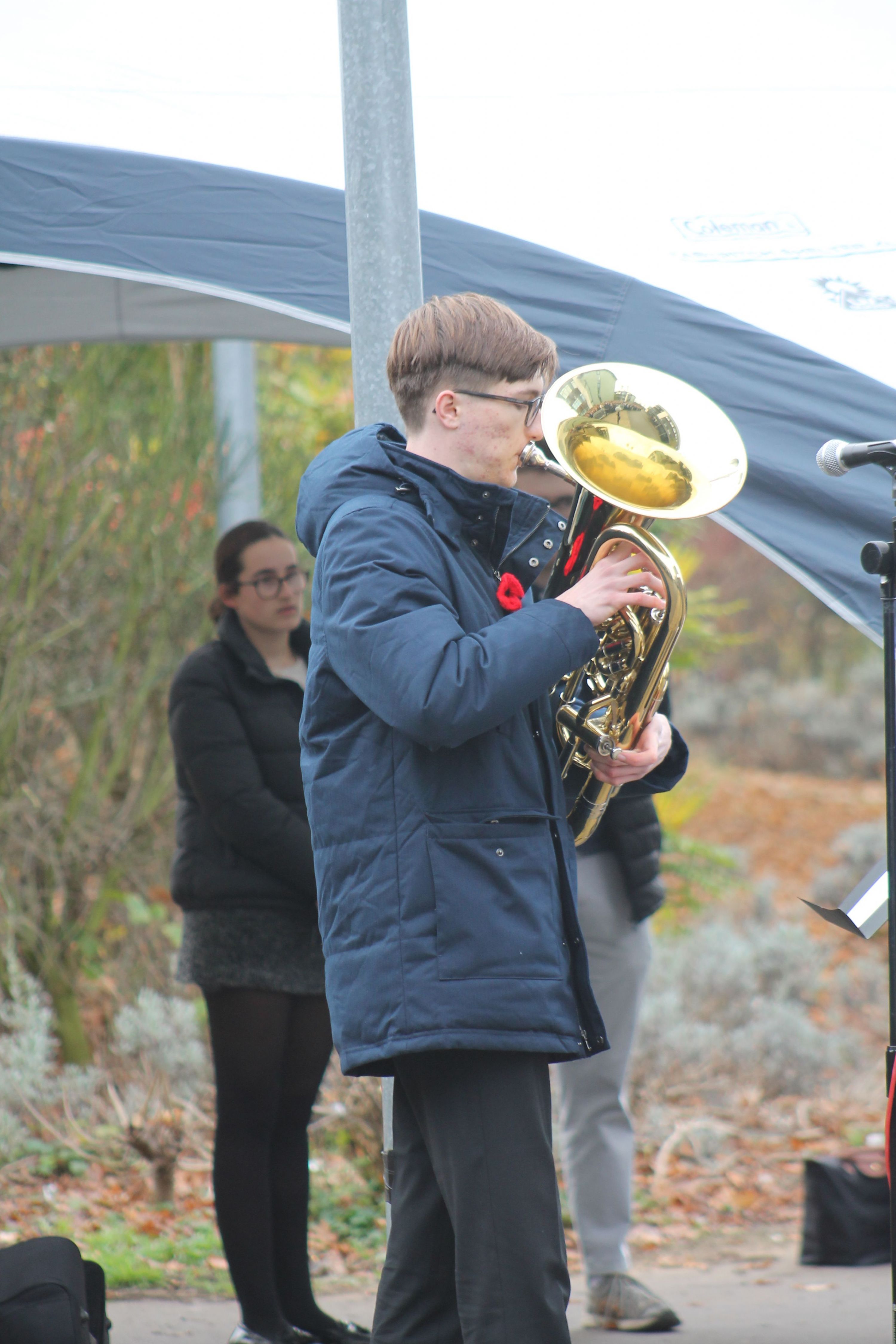 Year 11 student Martin playing the Last Post on the euphonium 