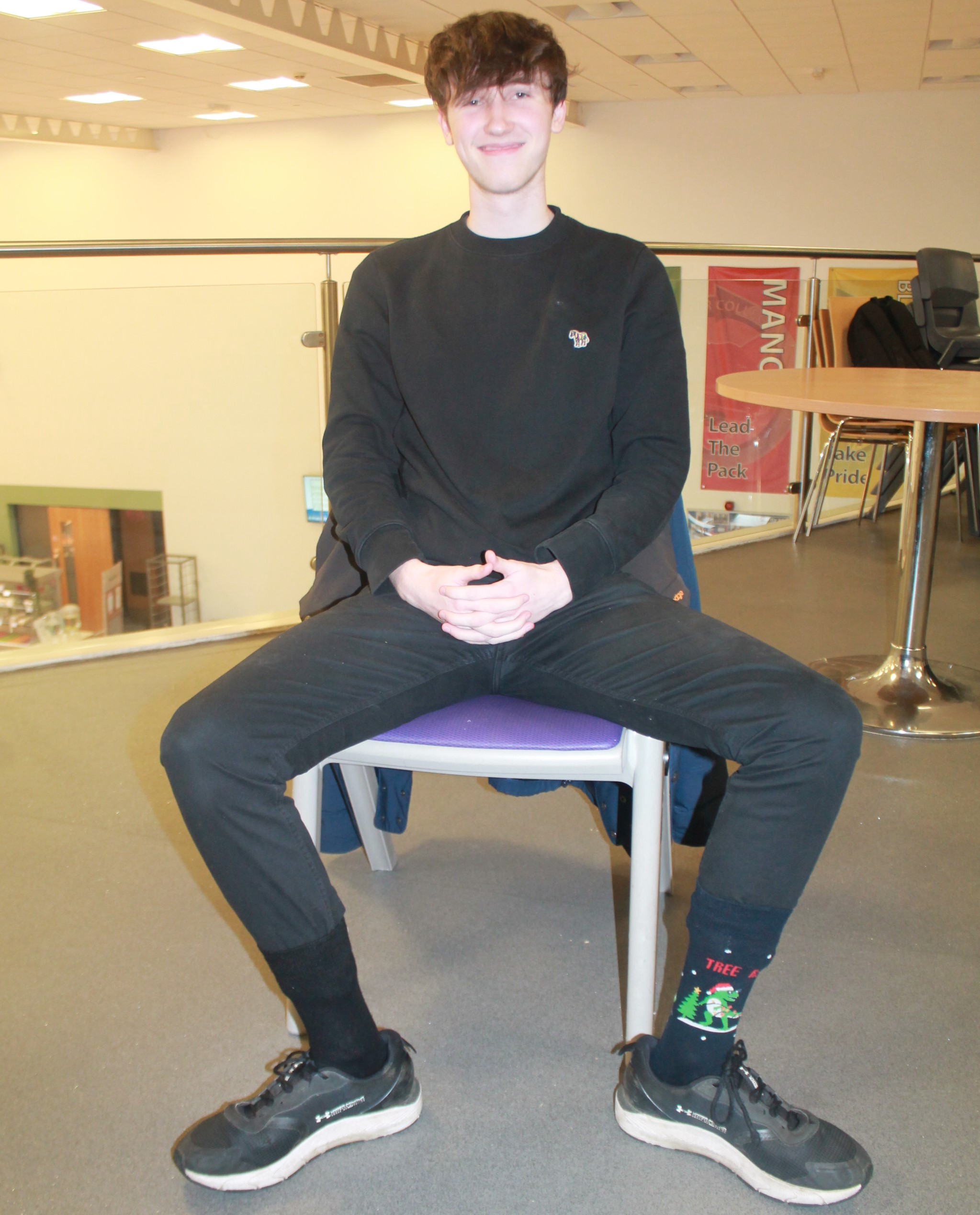 A sixth form student wearing odd socks to support Anti-Bullying Week