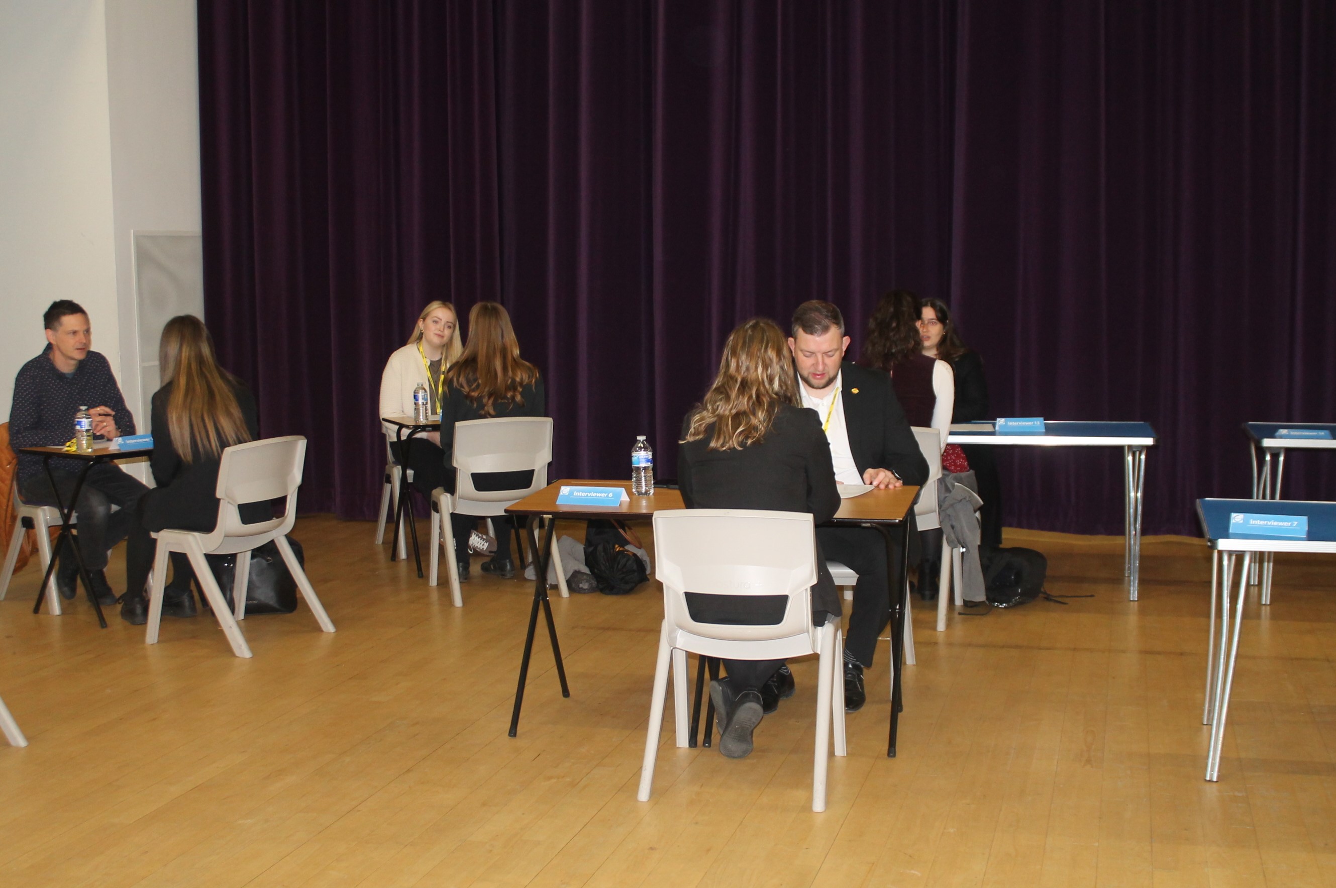 Year 11 students taking part in mock interviews in our theatre 