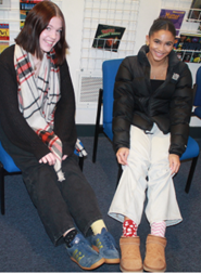 Two students wearing odd Socks for Anti-Bullying 