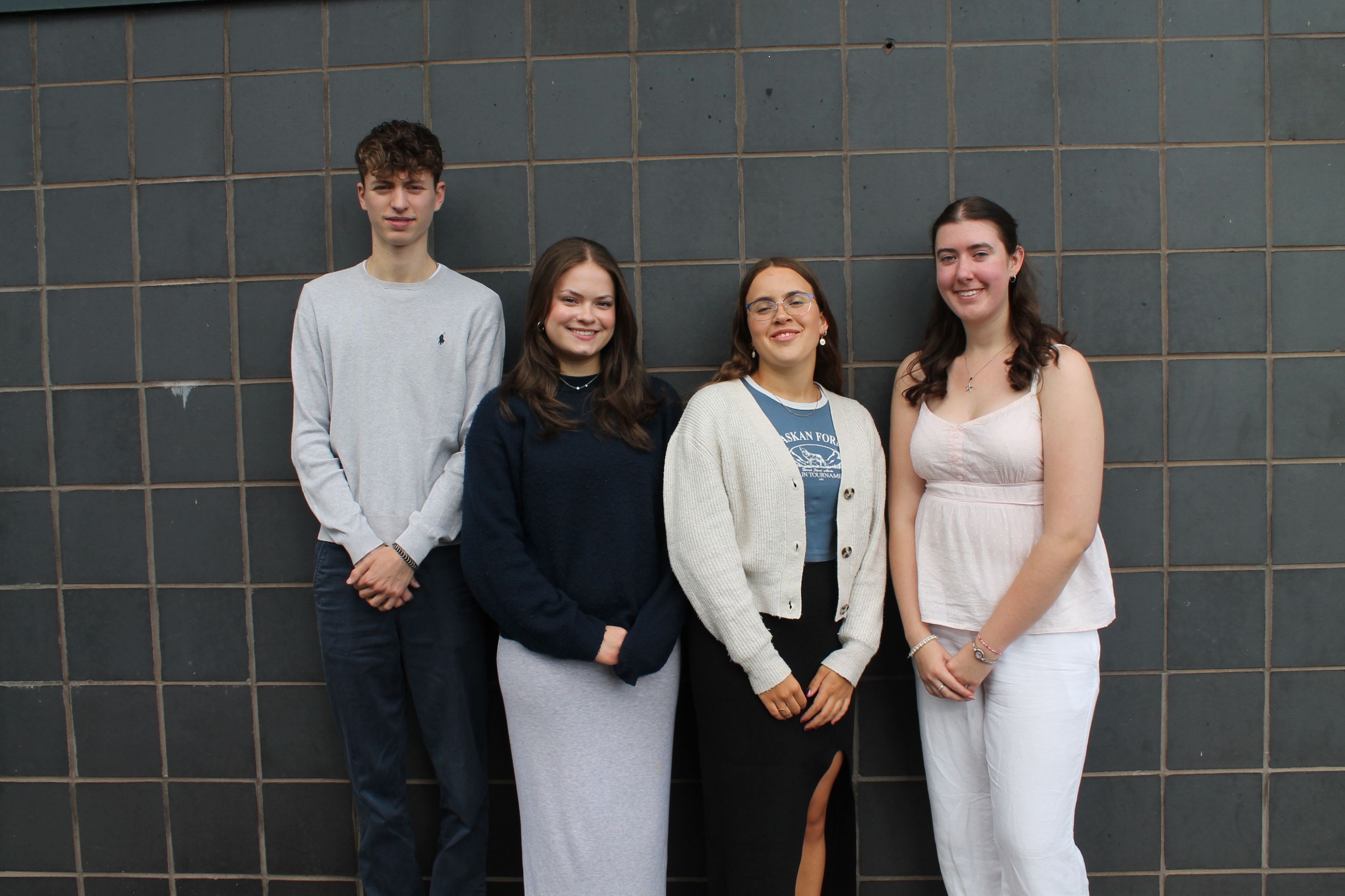 Four Year 13  students who are Assistant Senior Student Leaders Charity and  Community