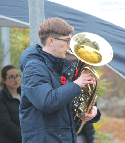 Student playing the Last Post on the euphonium